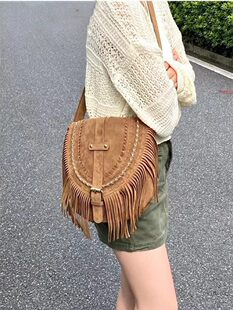 Capacious summer beach bag strap with tassels