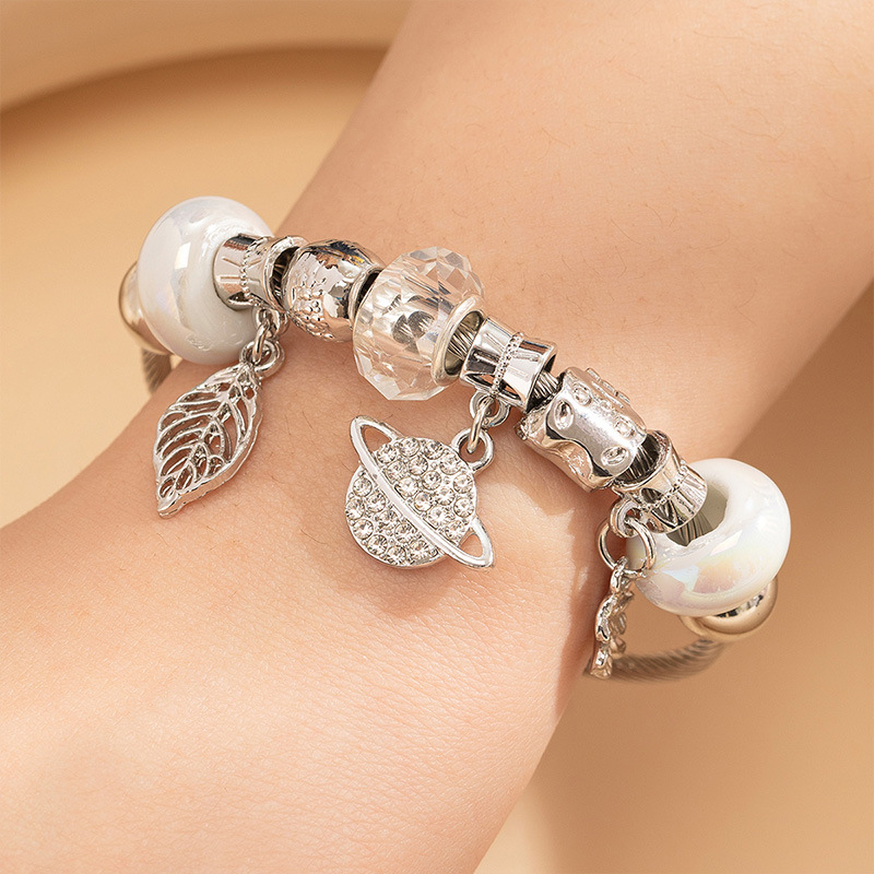 Panjia pulsera Dora DIY cuentas transfronterizas explosión oso accesorios de aleación colgante de hojas de Saturno brazalete abierto