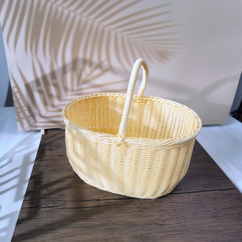藤の手提げかごの藤編みのかごのプラスチック編みの藤のかごの復古の田園の生花の手提げの花のかごの編みのかごの野菜のかご|undefined
