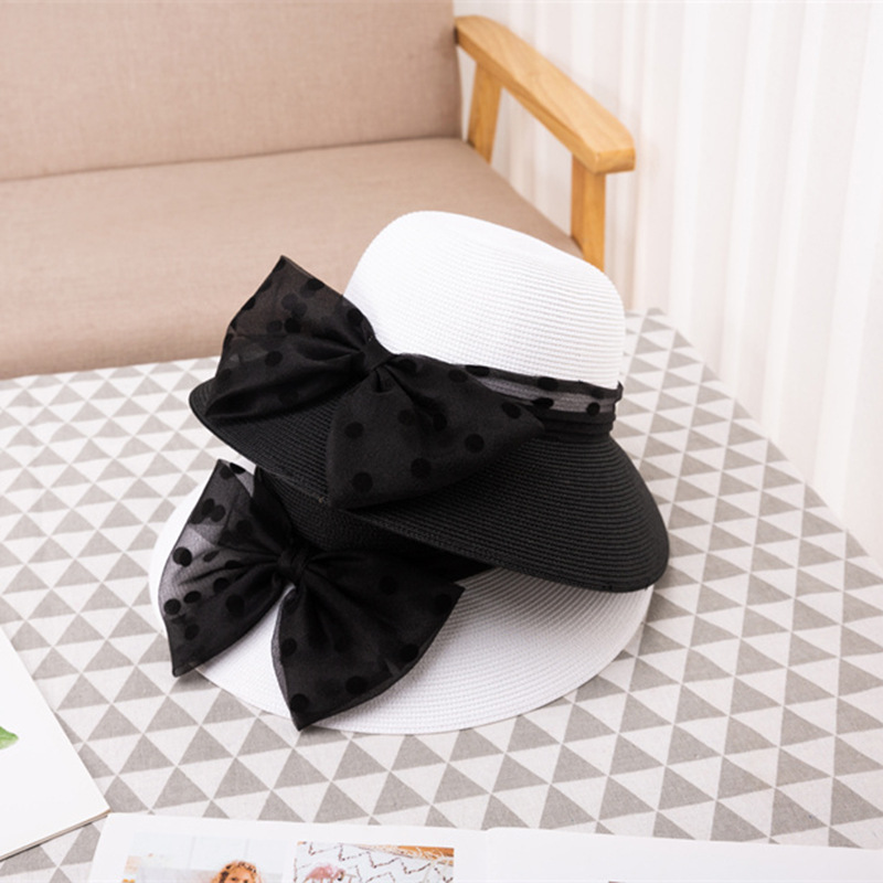 夏季新款黑色蝴蝶結遮陽帽女鏤空草帽防紫外線大檐遮臉防曬漁夫帽