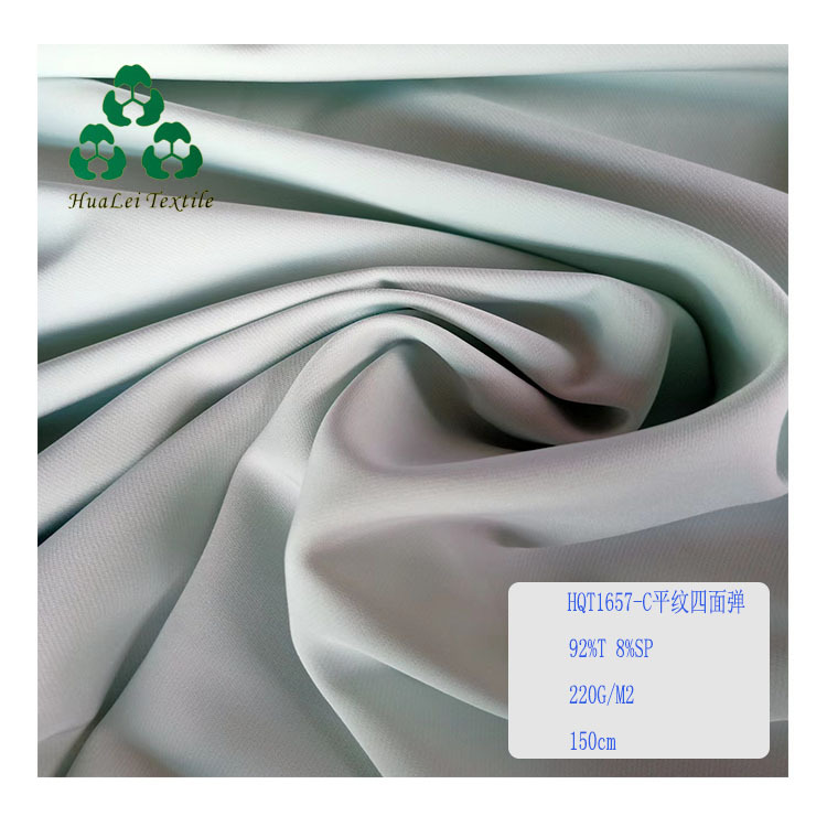供应涤纶四面弹面料平纹弹力布女装时装外套服装面料垂感好现货