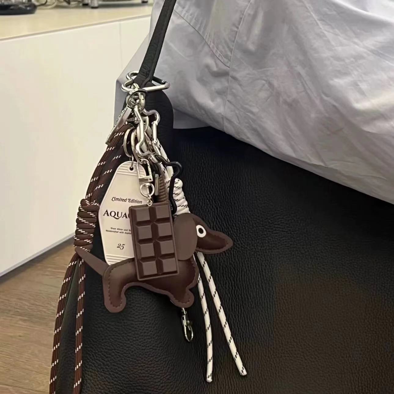 Sausage 25 brand spring rope chocolate brown and white rope pendant