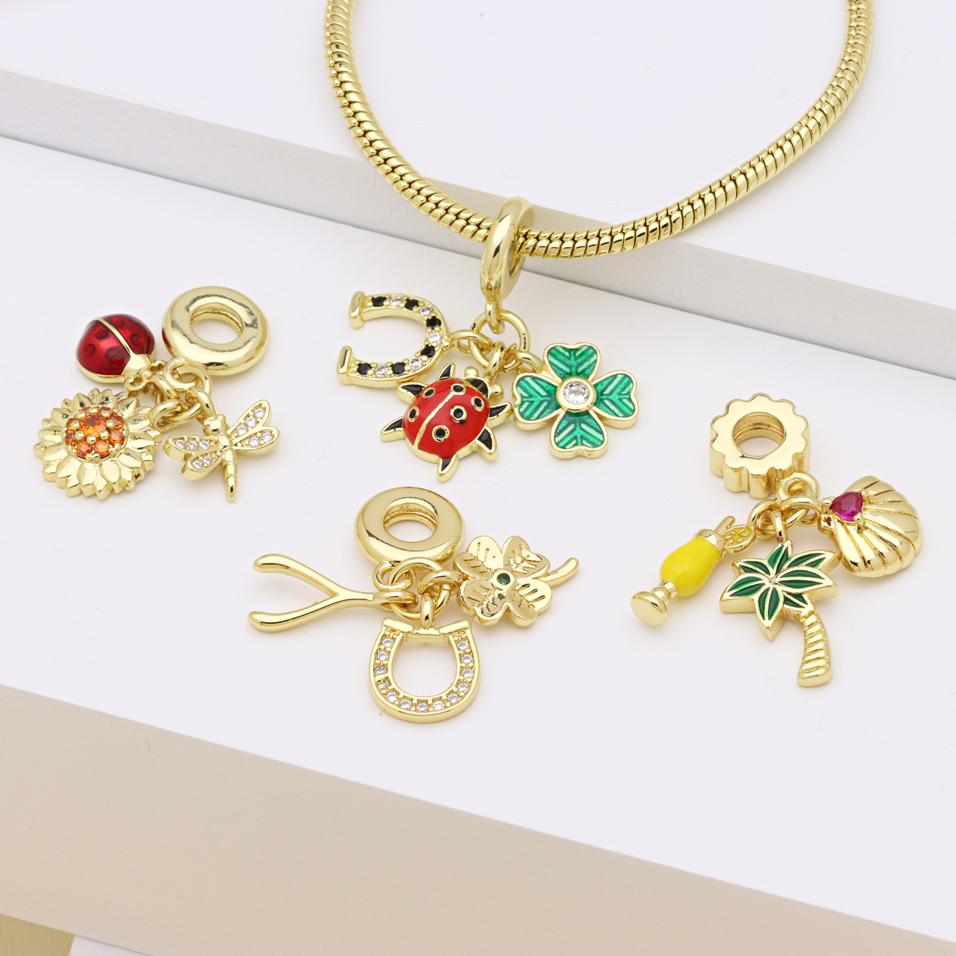 Bracelet pendentif motif libellule coccinelle et fleur en cuivre_voghion.com