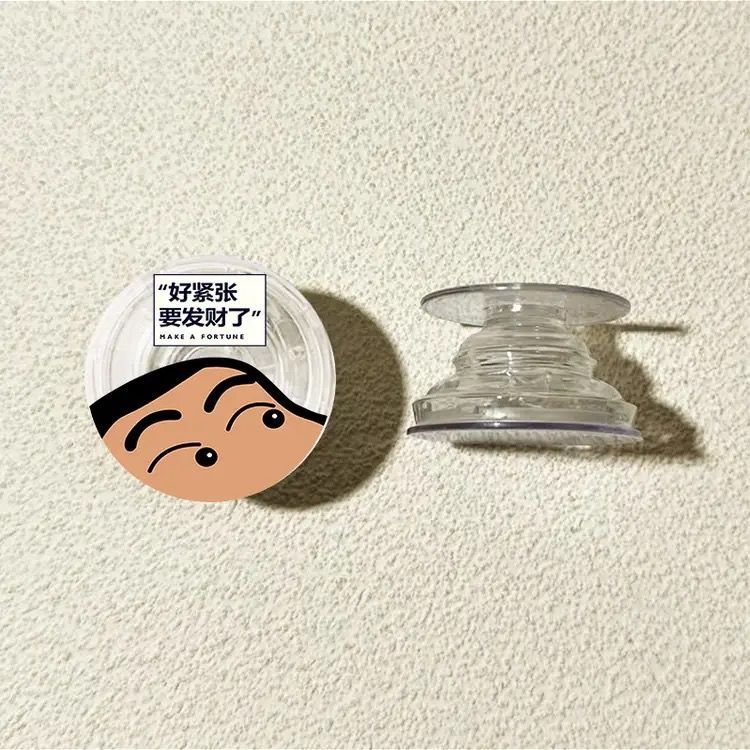 Crayón pequeño nuevo soporte de bolsa de aire redonda 360 ° rotatorio telescópico plegable soporte de teléfono móvil tipo de escritorio adhesivo