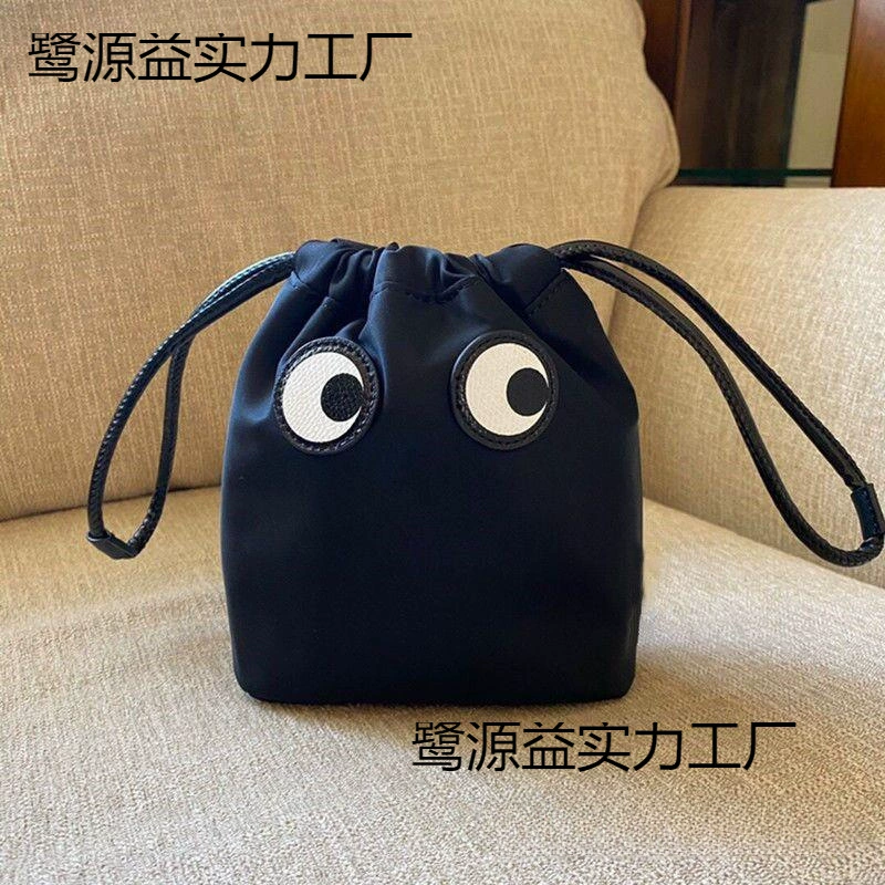 Новая нейлоновая модная сумка для хранения с героями мультфильмов, милые большие глаза, мини-портативная сумка-вкладыш, легкая косметичка на шнурке