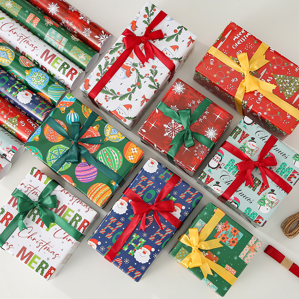 Nuevo papel de embalaje de papel de bronce de Navidad Papá Noel dibujos animados copo de nieve alce impresión de regalo embalaje de regalo