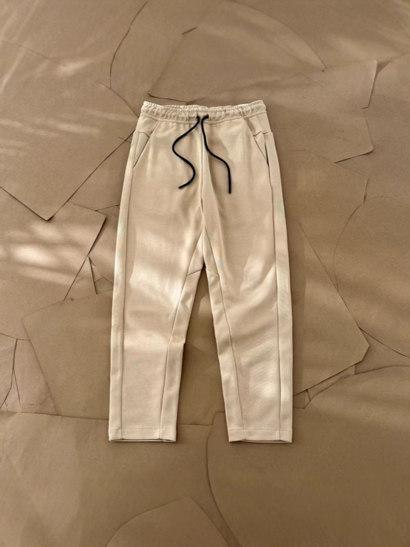 Nuevo hombre deportivo ocio al aire libre versátil punto suelto pantalones largos de piernas largas pantalones 211