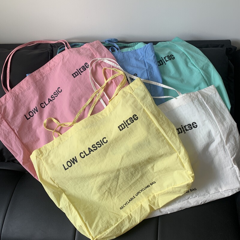 花儿与少年迪丽热巴同包黄色帆布包字母LOWCLASSIC大容量肩包|undefined