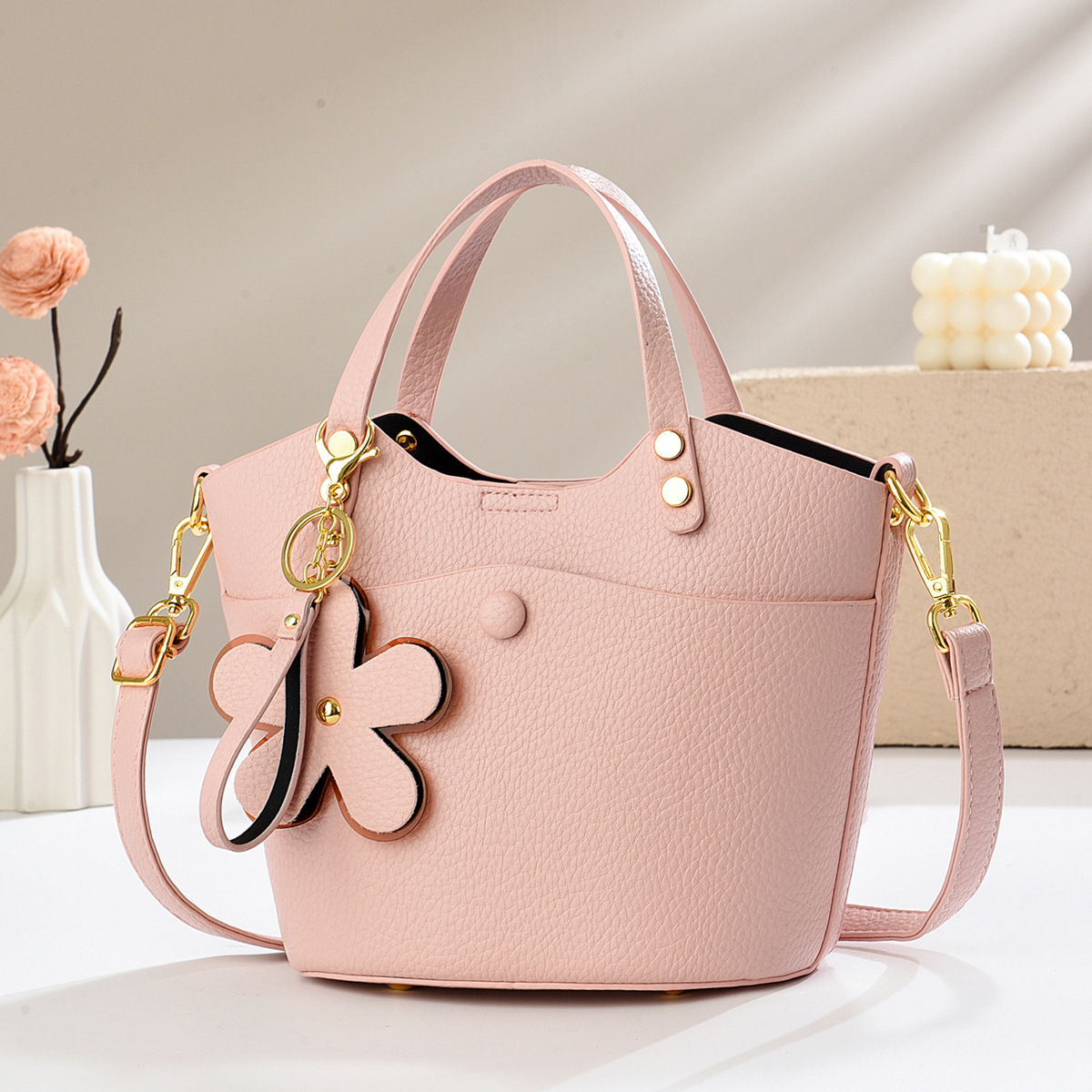 Exquisita bolsa de balde de verano 2025 nueva bolsa de hombro versátil textura mochila bolsos casuales bolsos transfronterizos