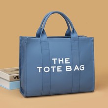 The tote bag新款優質帆布女包歐美ins潮流時尚托特包單肩斜跨包