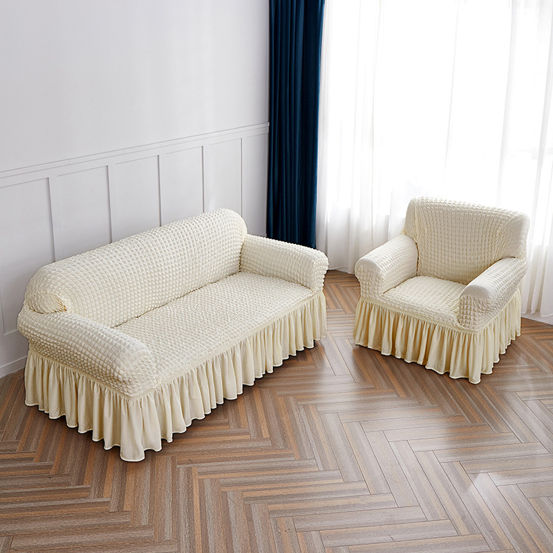 Cross-border Seersucker falda sofá cubierta combinación traje de color sólido todo incluido cubierta elástica sofá cubierta protectora cuatro estaciones Universal