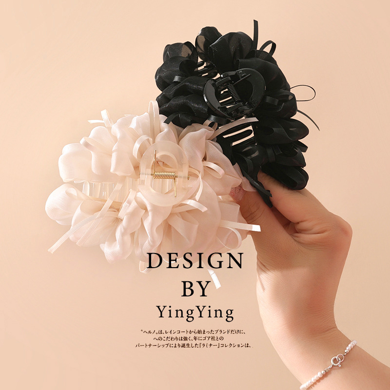 義烏工廠羽毛蝴蝶結抓夾髮夾髮飾夏季高級感發抓鯊魚夾後腦勺盤發