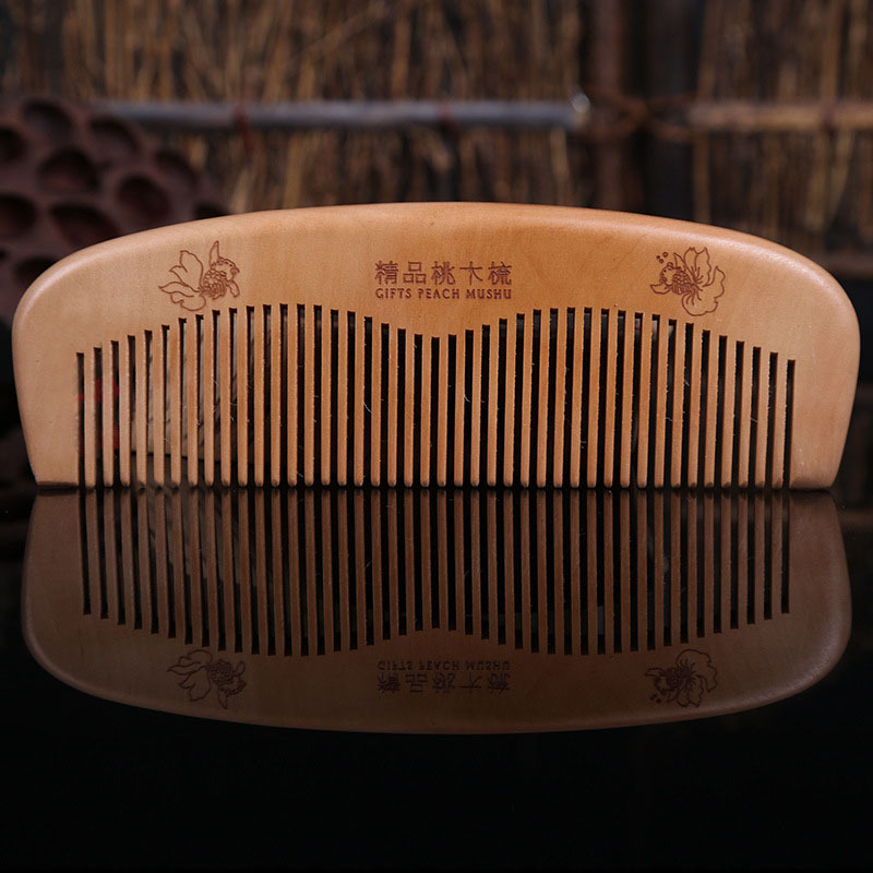 Artesanía grande peine de melocotón dos yuanes tienda de decoración de playa de regalo al por mayor peine de melocotón