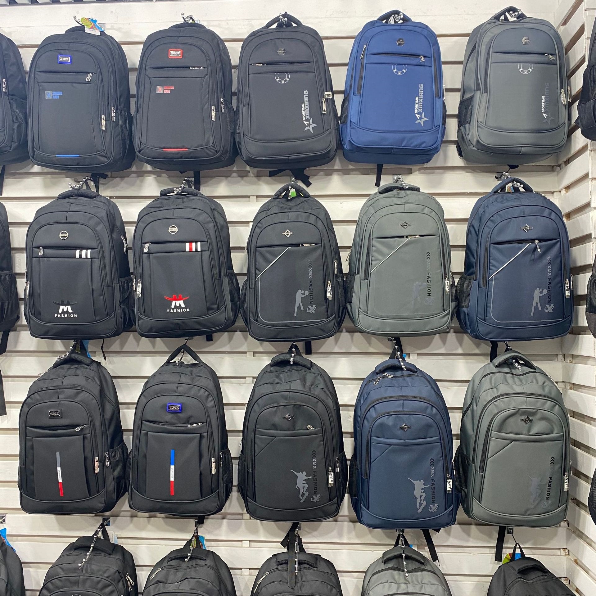 2026 primavera hombre Oxford tela mochila casual urbano simple viaje al aire libre estudiantes de color sólido almacenable