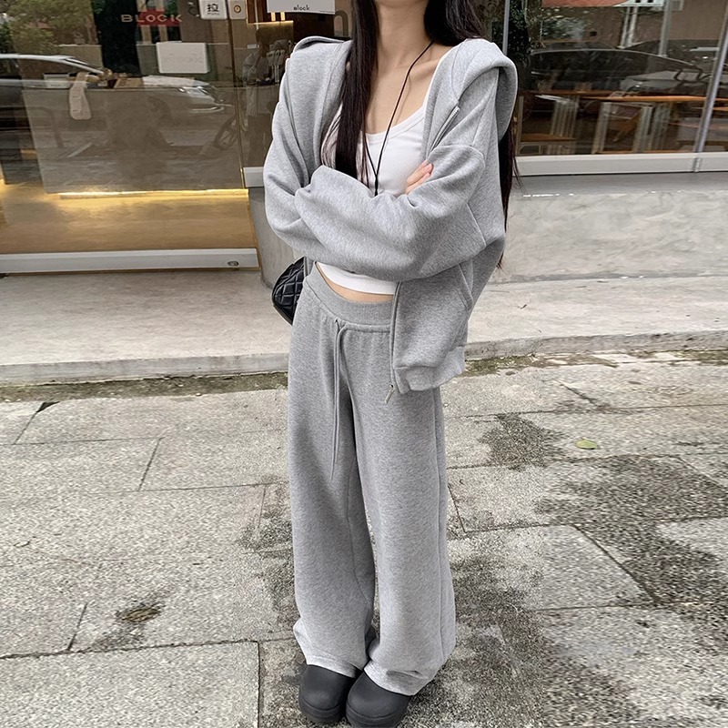 Este año, la popularidad de pantalones casuales sueltos bf perezosos, pantalones casuales de moda, pantalones de pierna ancha rectos negros, pantalones de caño para mujeres