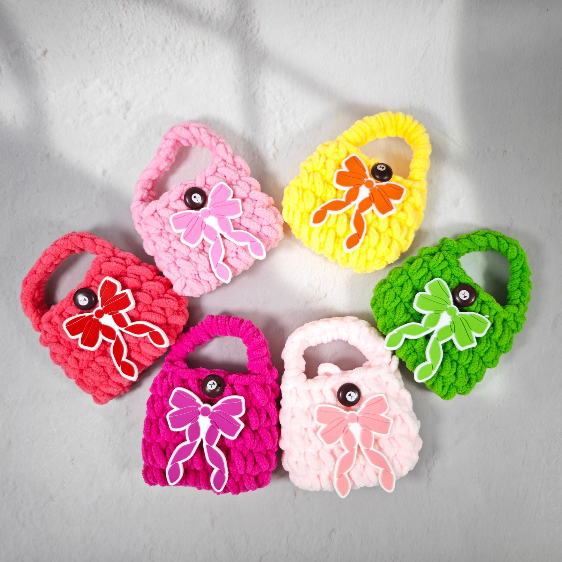 Nuevo lindo oso regalo tipo arco bolsas de auriculares de punto bolsas de cambio de color sólido bolsas de cambio de peluche