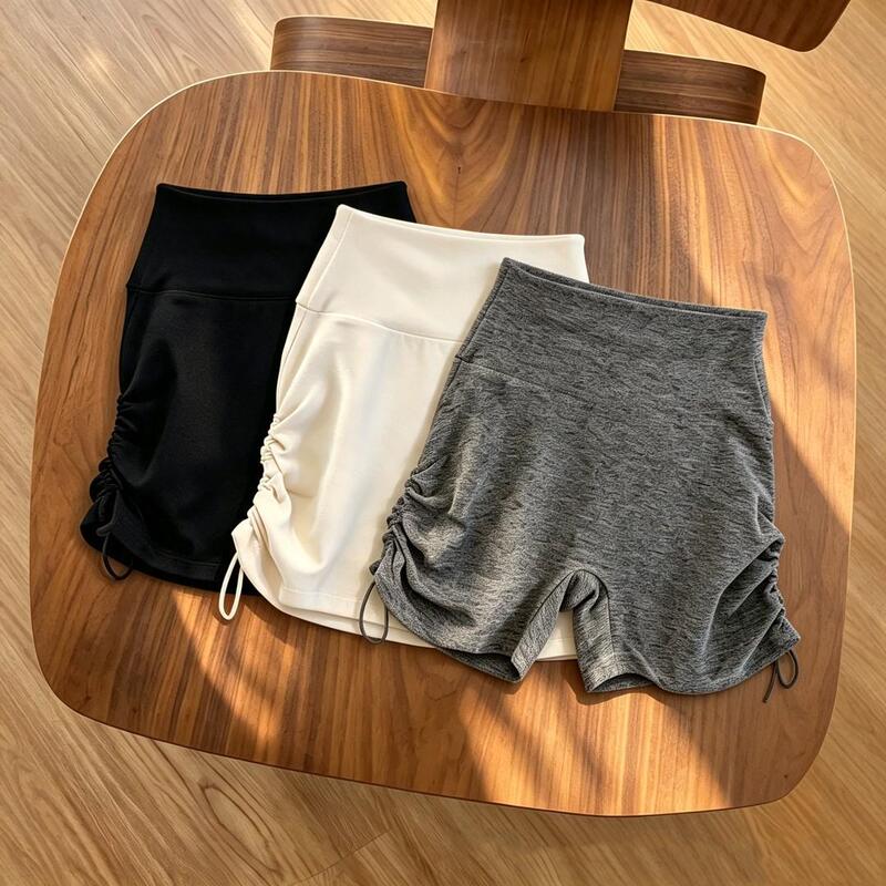 New drawstring butt-lifting fitness shorts for women, elastic quick-dry peach butt yoga three-point sports shorts for summer outdoor wear New drawstring butt-lifting fitness shorts for women, elastic quick-dry peach butt yoga three-point sports shorts for summer outdoor wear