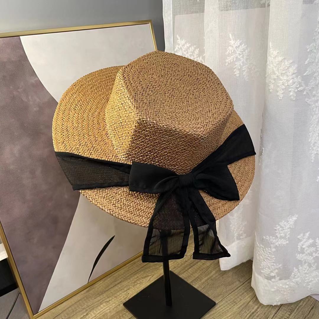 A female hat with a spring and summer ribbon, butterfly sash, hexagonal straw hat, Korean street style, anti-ultraviolet sun hat, and a wide-brimmed hat detail image 3