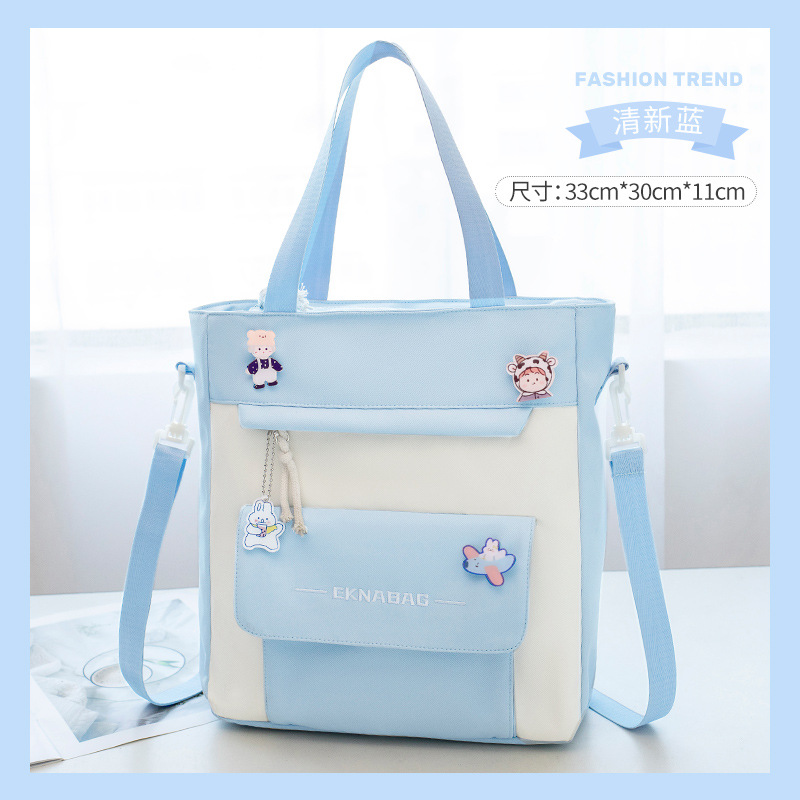 Bolso de matrícula de gran capacidad Bolso de hombro para estudiantes de primaria Bolso de mano Macaron Bolso de reparación de doble hombro Bolso bandolera de arte cruzado