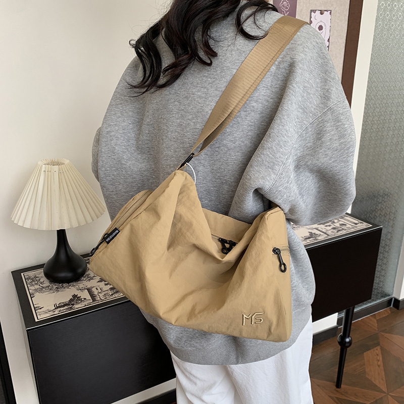 カジュアルショルダーバッグ女性2025新型中学校学生収納旅行カバン運動ヨガフィットネス斜めショルダーバッグ男性|undefined