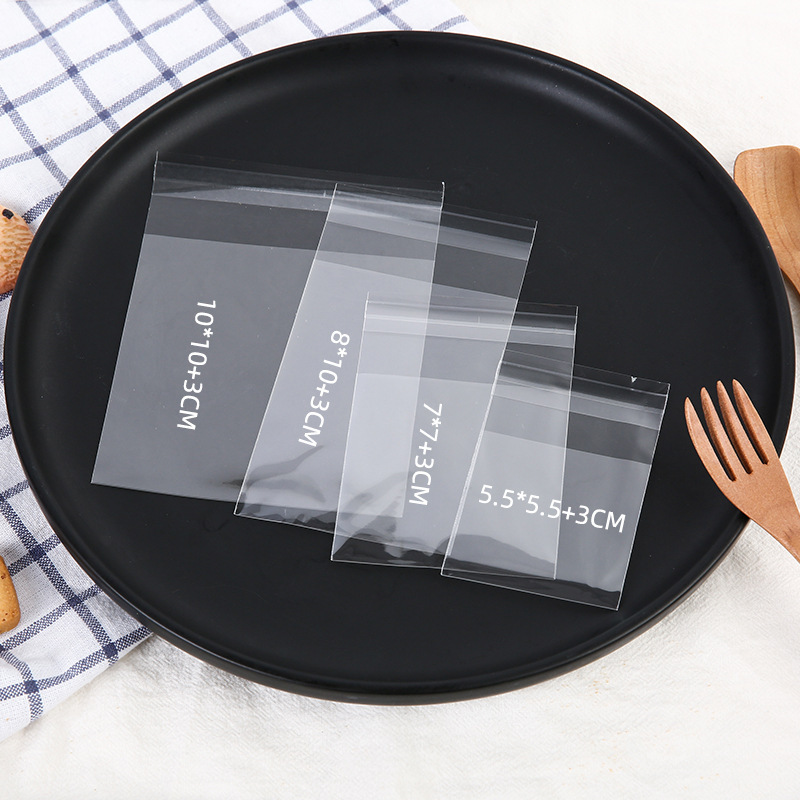 Bolsa autoadhesiva transparente bolsa de té perfumada bolsa de embalaje de galletas caramelo yema de huevo crujiente copo de nieve hecho a mano bolsa de embalaje crujiente ventas directas de fábrica