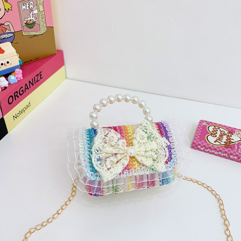 Verano nuevo arco de paja bolso de perla bolso de moda para niños bolso de princesa de jardín de infantes