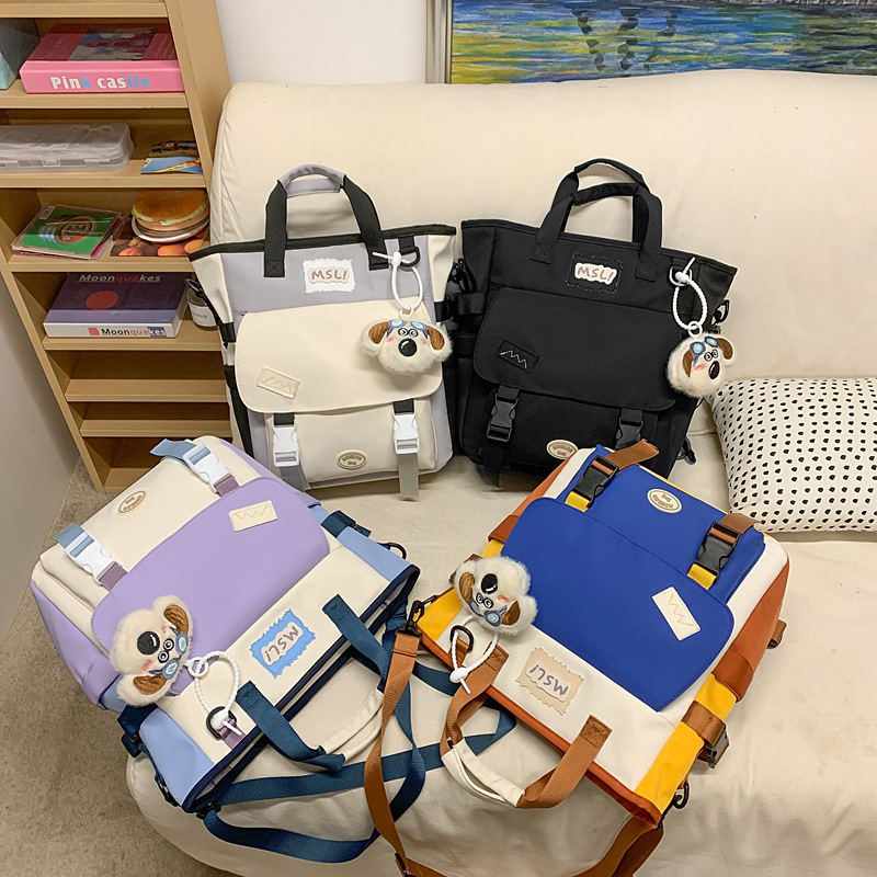 新商品の学院風のリュックサックの男女大衆のデザイン感は色の学生のかばんの潮流にぶつかります。|undefined