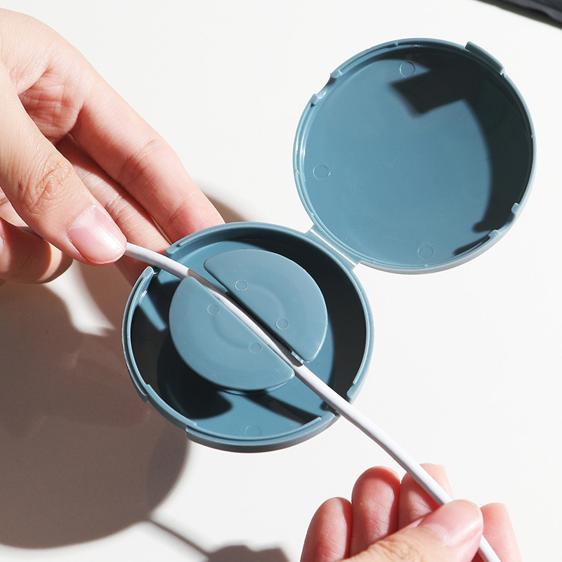 Small handheld portable round rotating storage box, mobile phone, charging cable