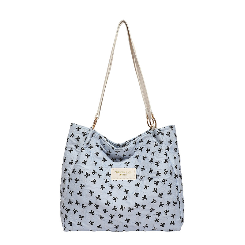 Bolso de tote 2025, primavera y verano, nuevo tipo de bolso de hombro, moda, bolso de mano, bolso de viaje de estilo extranjero para mujeres.