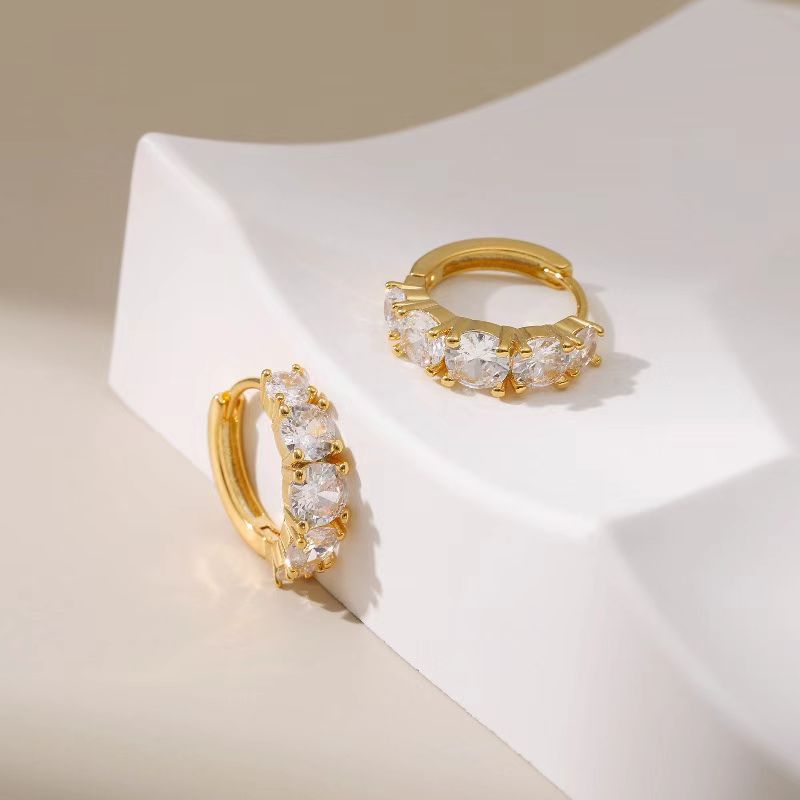 Europa y los Estados Unidos ins aretes de círculo de viento nicho de diseño de aretes de zircon ligero lujoso temperamento amplio aretes de viento de vacaciones