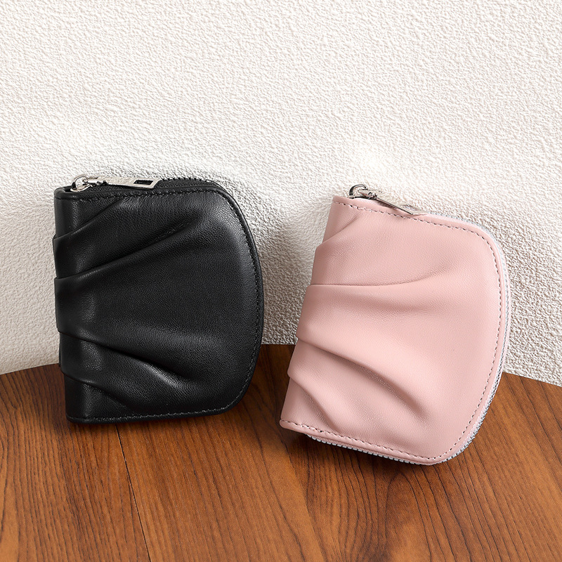 2024 nuevo pliegue sensación de billetera de mujer simplista lindos japoneses y coreanos pequeños bolsos de cambio multifuncional billetera en línea