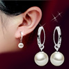 Silver glossy earrings from pearl, bright catchy style, wholesale