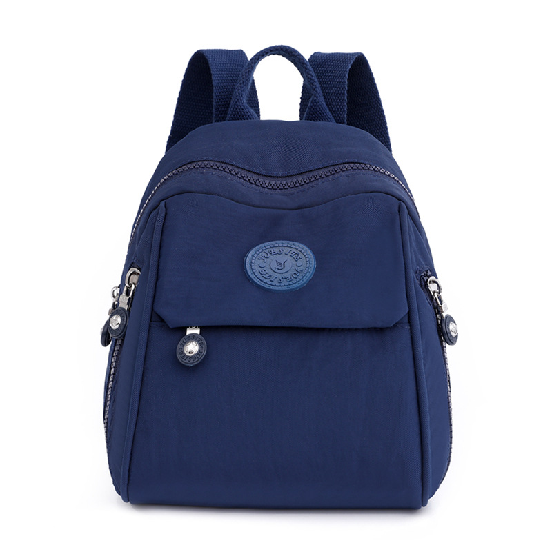Mochila para mujer, mochila pequeña de tela Oxford de gran capacidad, resistente al agua, nueva mochila escolar de nailon lavanda de todo fósforo de moda