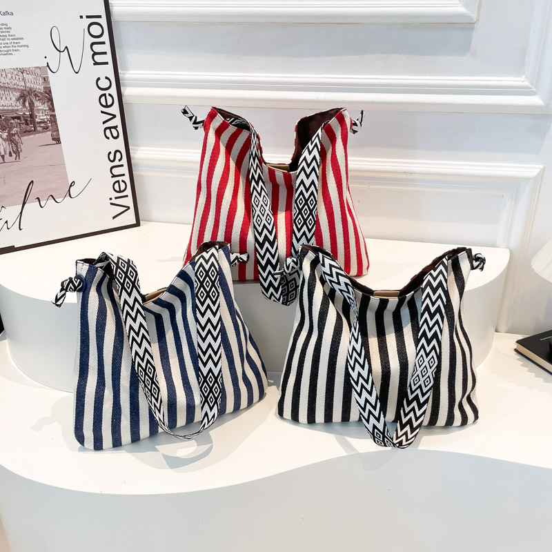 Bolsa de lona de hombro a rayas coreanas para mujeres 2025 nueva bolsa de mano de arte retro gran capacidad bolsa de viaje de moda