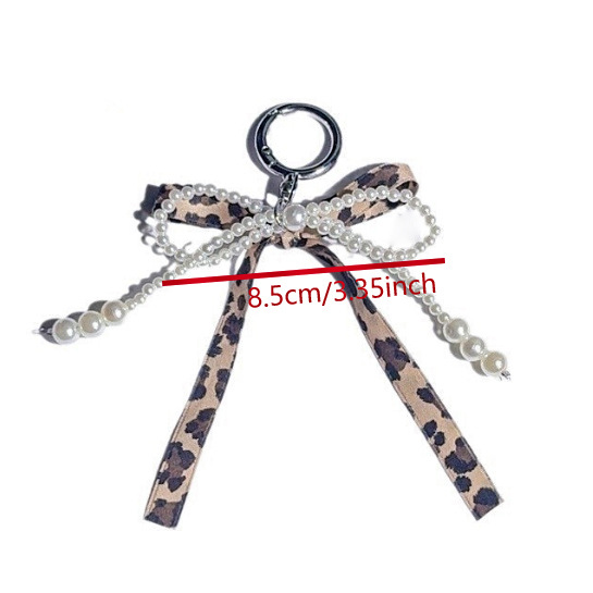 Coreano estricto color curry cinta arco perla bolsos bolsos llavero de encaje dulce bolsos colgantes pequeños vientos fragrantes