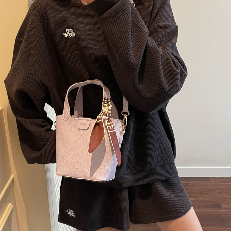 2025 verano nuevo bolso de moda coreano canasta bolsa de cubo bolso de hombro de alta calidad bolso de mochila versátil