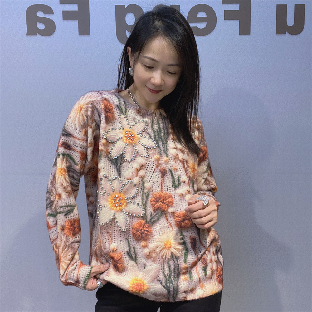 Ropa de comercio exterior de invierno 2025 nueva ropa europea de mujer visón clavos taladro camisa de punto camisa de manga larga suéter de cuello redondo chaqueta superior