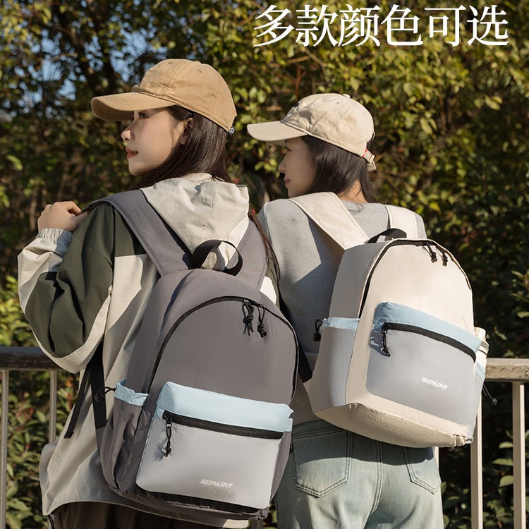Diseño de contraste de color sensación de deporte al aire libre torre de sillo plegable mochila a prueba de agua de senderismo bolsa de montaña bolsa de estudiantes universitarios