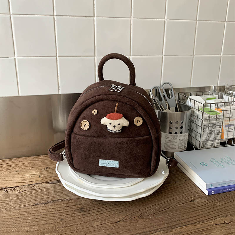Caricatura lindo muñeca mochila de niña 2025 nueva moda mini mochila de comercio exterior transfronterizo mochila esmerizada mujer