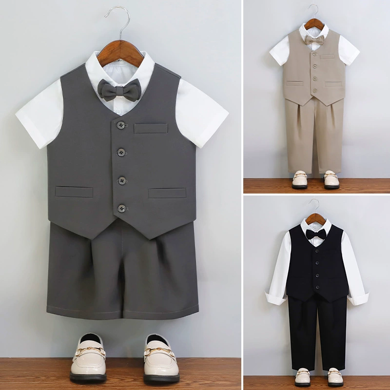 Мальчик в жилете костюме для мальчиков