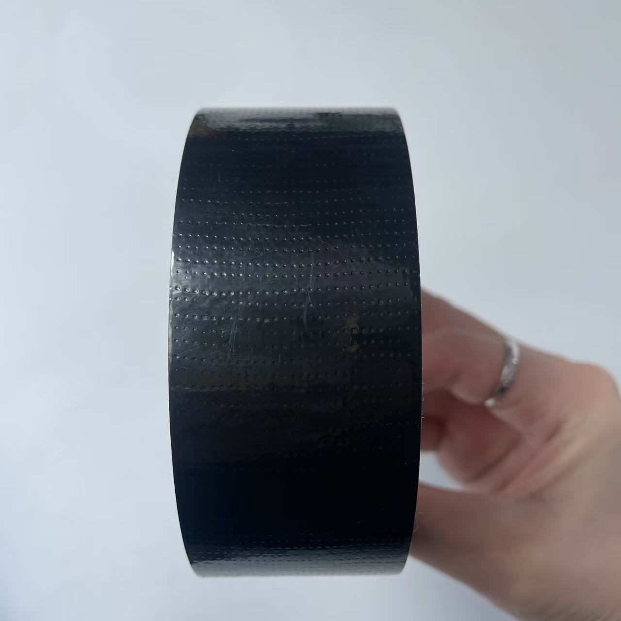 Tape adhesiva de tela de alta viscosidad decoración sin rastro película adhesiva de tela de malla adhesiva de tela unilateral cinta adhesiva de tela