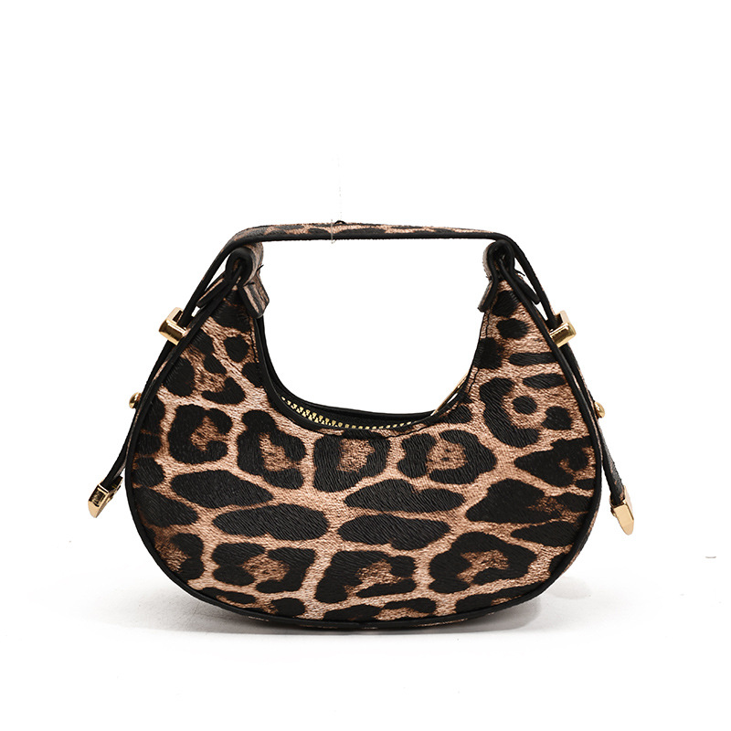 Tendencia nueva bolsa de mujer casual 2024 personalidad coreana de invierno mini media luna temperamento leopardo bolso de mano