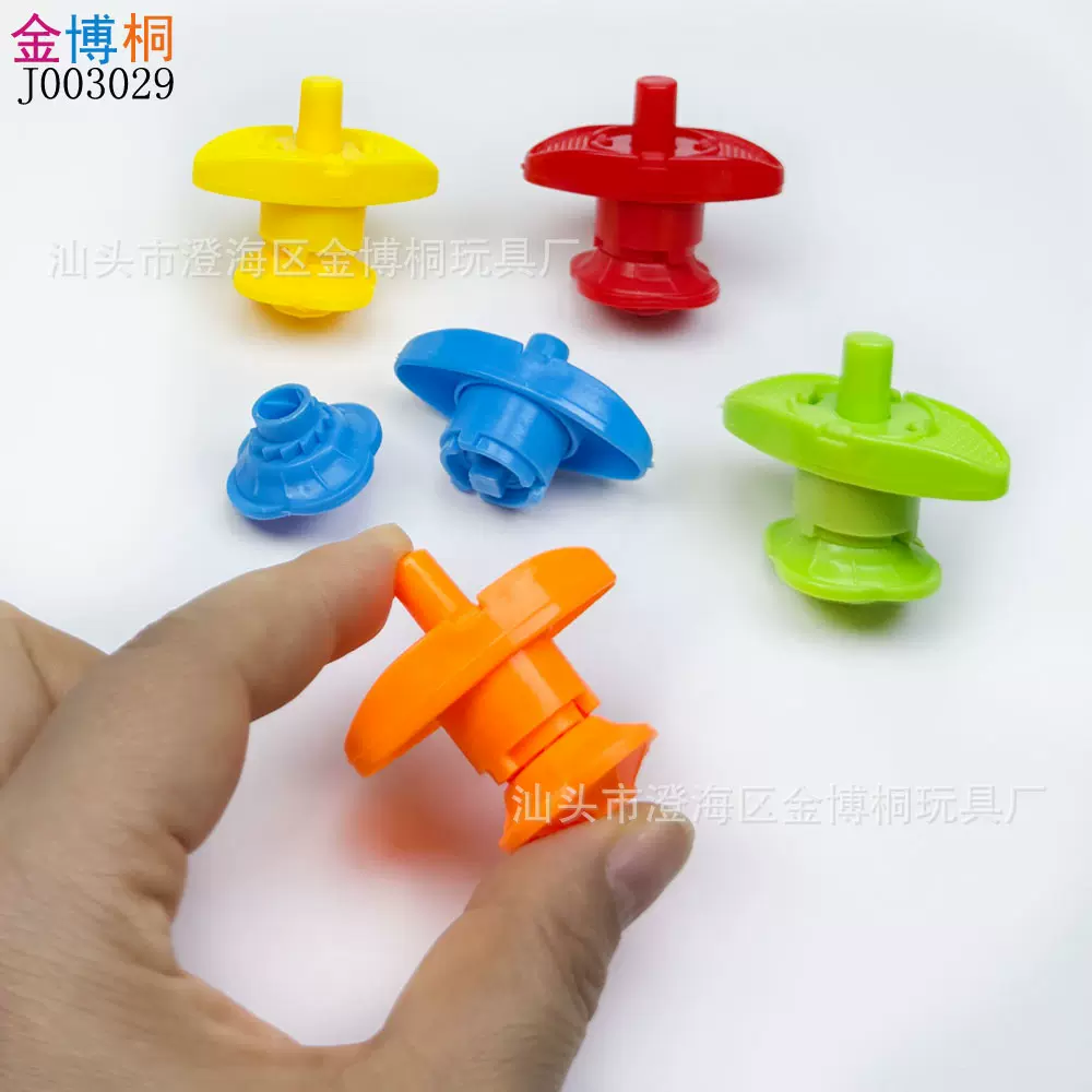 迷你小陀螺儿童玩具手拧旋转上链陀螺弹射带发射器塑料彩色陀螺
