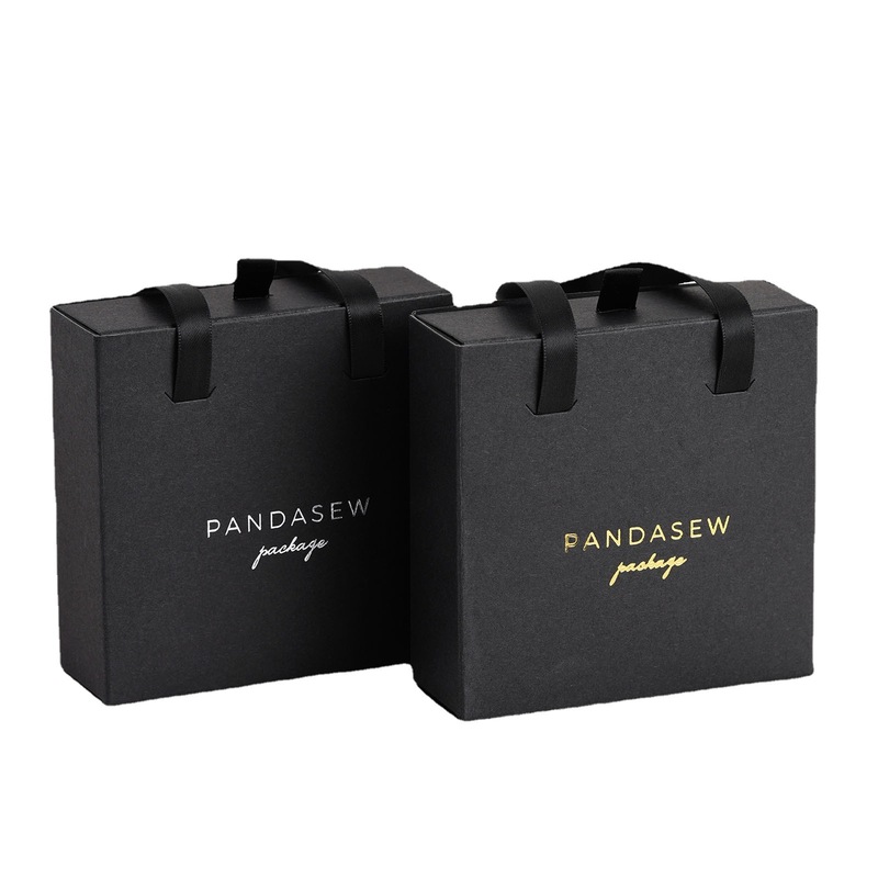 陽に花を咲かせるxpandasewはロゴを印刷して黒い手持ち式の引き出しの箱のネックレスのイヤリングの指輪のピアスの箱を印刷します。|undefined