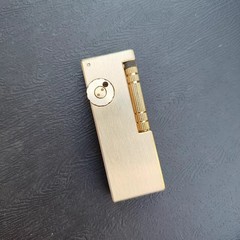 黄铜火机新款侧滑点火黄铜鱼肠煤油打火机高密封窄机测滑砂轮送礼
