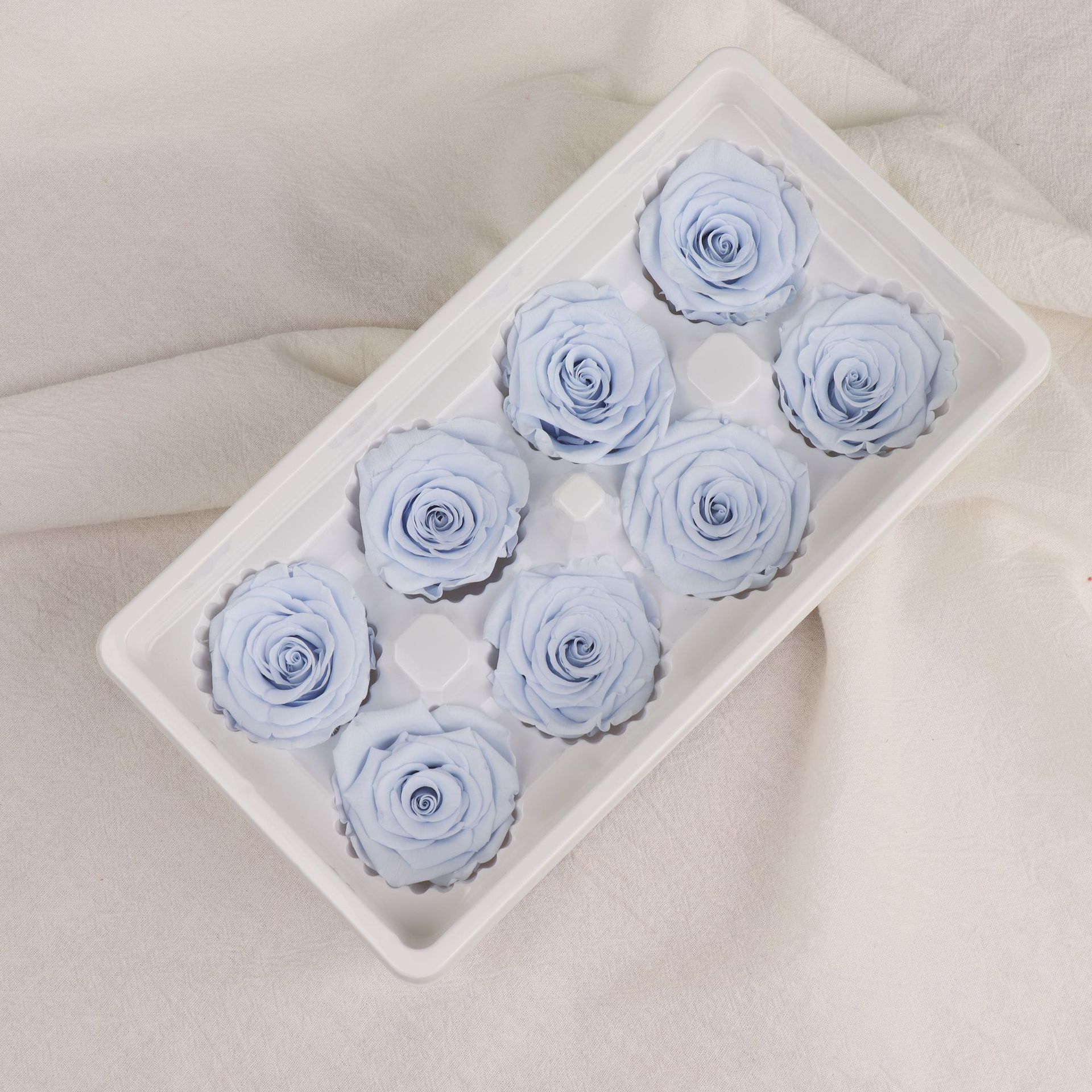 Clase A azul claro 4-5cm-8 flores/caja