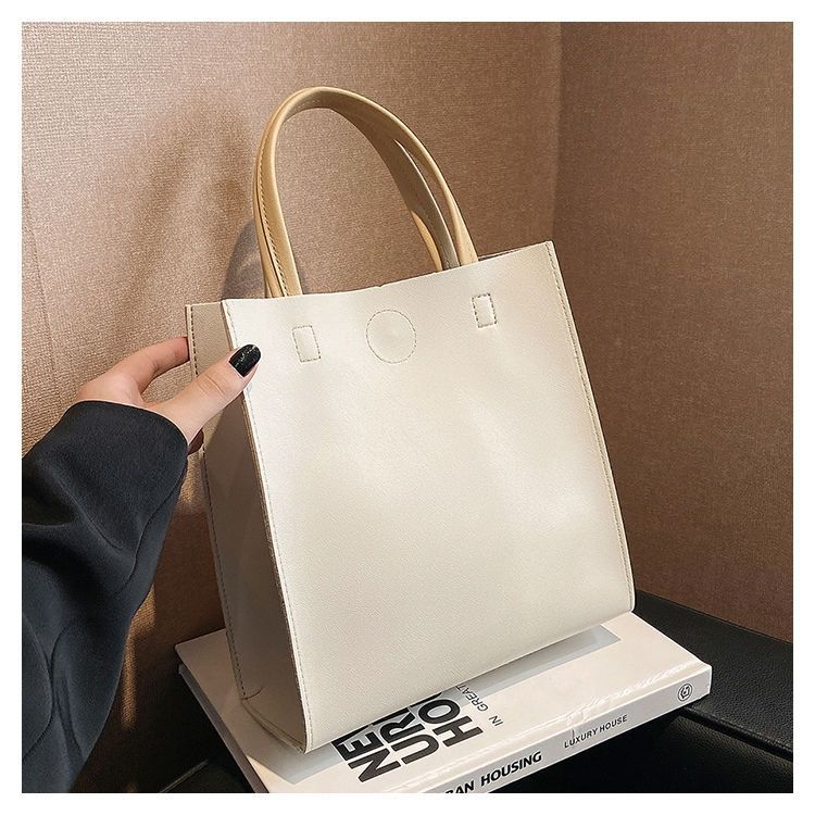 2024 New Bags Korean Version Versatile Commuting Bags Large Capacity Portable Tote Bag Temperament Popular Women’s Bag Vertical Style_voghion.com