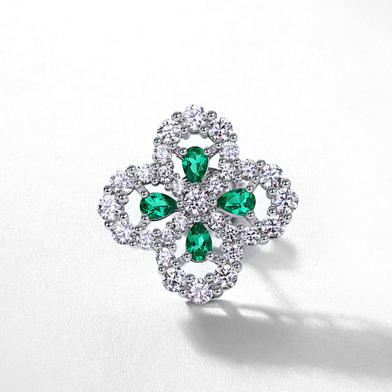 Pendientes de trébol de cuatro hojas de lujo ligero de estilo explosivo transfronterizo europeo y americano S925 con incrustaciones de plata para cultivar aretes de esmeraldas brillantes al por mayor