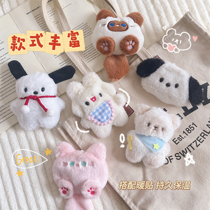 アニメのぬいぐるみの暖かい手の刺繍は発熱した手で暖かい手の卵を握って冬にポケットの暖かい赤ちゃんを交換することができる|undefined