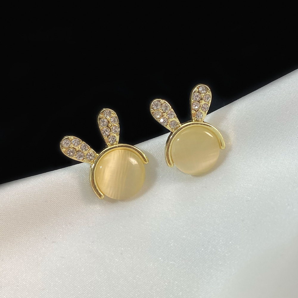 Aguja de plata de moda alta sensación de diamante de goteo de aceite pendientes nicho universal elegante pernos de orejas ligero lujoso temperamento simple orejas para mujeres